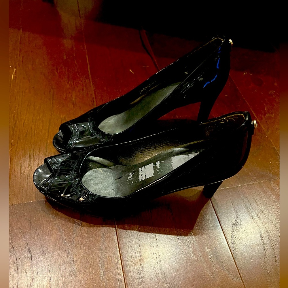 Stuart Weitzman black patent leather peep- toe pumps. Size 8.5 medium